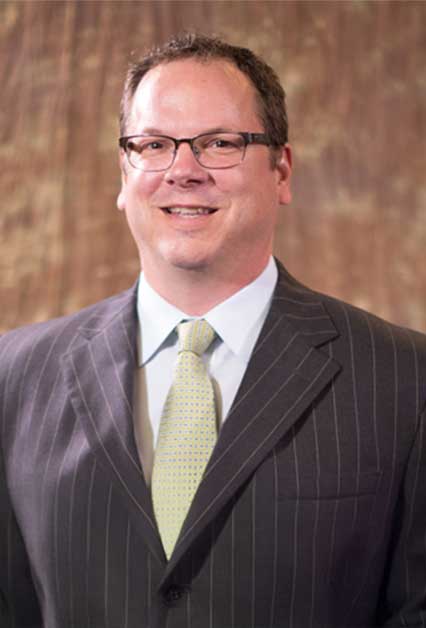 Dr. Charles H. Means, DC