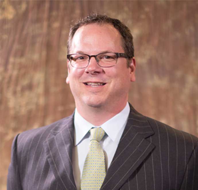 Dr. Charles H. Means, DC